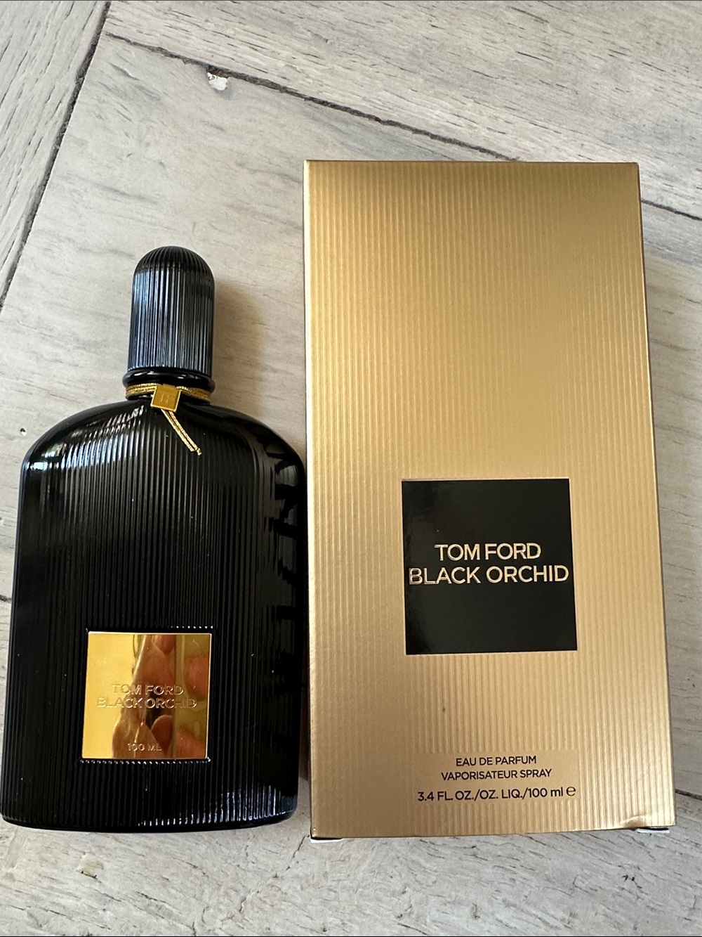 Tom Ford Gold & Black Black Orchid  large 3.4 oz  proceeds to charity.